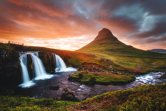 An epic sunset with Kirkjufellsfoss waterfall. Location Iceland, Europe. © Leonid Tit