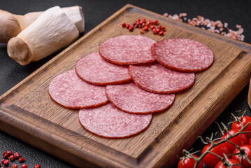 Delicious fresh smoked sausage with salt and spices cut into slices