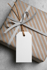 White paper gift tag mockup, space for text, birthday holiday concept