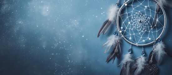 Close up of a dream catcher on gray background with copy space