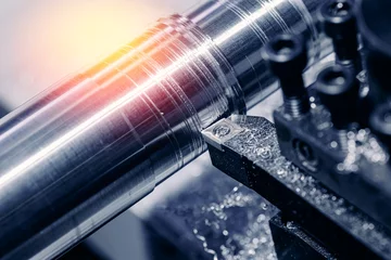 Foto auf Acrylglas Banner Industry machine iron tools. CNC turning cutting metal is operation. © Parilov