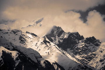 Fototapeta na wymiar Kinnaur Kailash Mountain covered in clouds