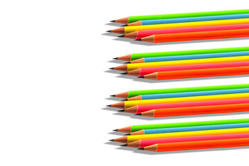 Fototapeta premium Multiple groups of sharpened colourful pencils on white background.