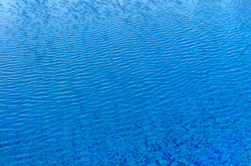 the sun is reflected in the water in the pool 2