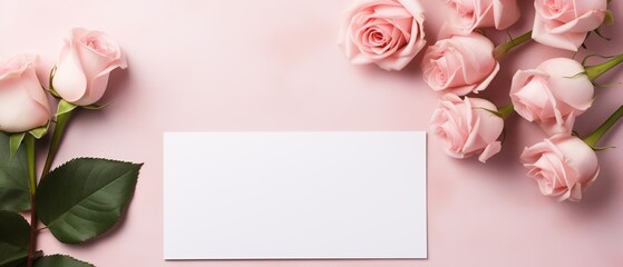 A flat lay featuring elegant roses alongside a blank love note offers a canvas of romance and possibility. The design includes a empty space for heartfelt messages, perfect for expressions of love