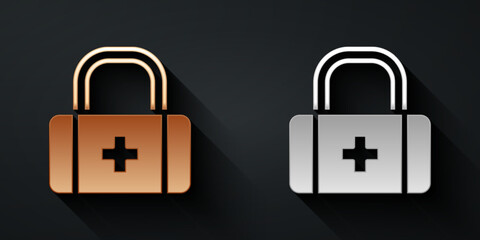 Gold and silver First aid kit icon isolated on black background. Medical box with cross. Medical equipment for emergency. Healthcare concept. Long shadow style. Vector