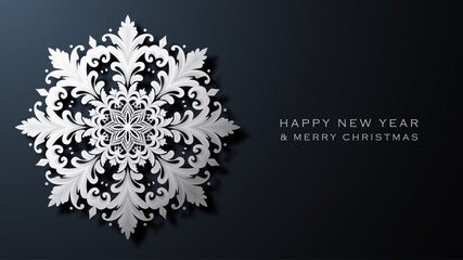Large white snowflake on a dark background. Merry Christmas and Happy New Year.