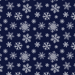 The pattern is beautiful with white interesting snowflakes on blue background