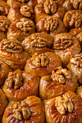 Turkish desert baklava with peanut, pistachio for holiday or ramadan. Traditional Middle Eastern Flavors. Selective focus, pattern.