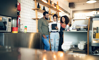 Happy woman, tablet and team in cafe for manager, meeting or planning together at coffee shop. Female person, entrepreneur or restaurant owner smile in teamwork on technology at retail store