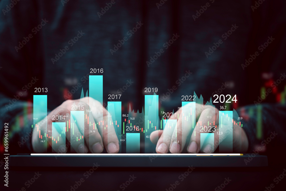 Aufkleber businessman using computer keyboard with virtual increasing graph from computer laptop, business inv