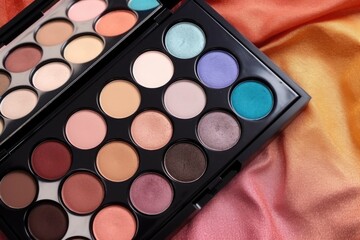 top view of makeup palette with colorful eyeshadows