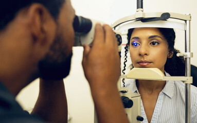 Woman, optometrist and eye exam with vision and laser machine, health and vision with optometry and...