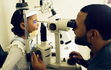 Eye doctor, machine or child consulting to help eyesight at optometrist for a optical assessment....