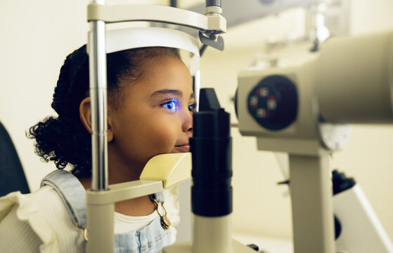 Child, eye exam and optometry for medical, vision and healthcare consultation or glaucoma check. Young client or girl kid with laser technology, blue light or machine scanning and ophthalmology test