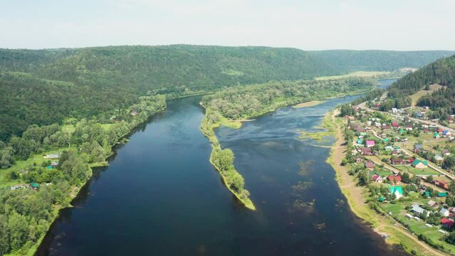 Southern Urals in summer, the Ufa River near the village of Krasny Klyuch. Aerial view.