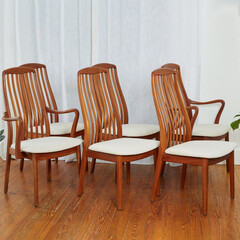 Mid-century modern wooden dining room chairs. Interior photograph of set of 6 chairs. 