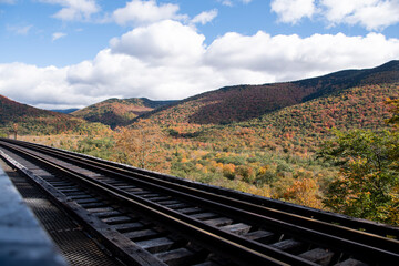 Fototapeta premium White Mountains, Fall, Colors, Autumn, Fall colors, New Hampshire, Forest, Trees, Nature, Landscape, Art, Red, Orange, Green, Pond, Lake, Water, Sky, Clouds, Sun