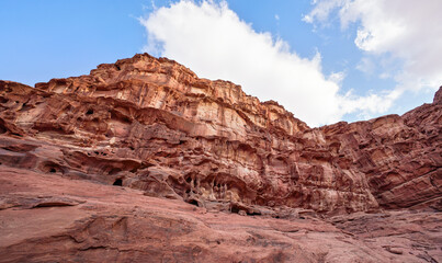 Fototapeta na wymiar Red orange sandstone rocks formations in Wadi Rum (also known as Valley of the Moon) desert, Jordan