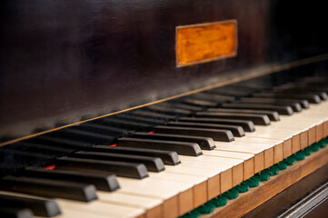 Fototapeta na wymiar piano keys close up, pen classical piano showing the strings internal mechanisms