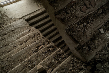 old stone stairs in abandoned building © Kirill