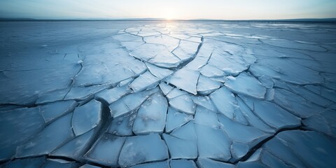 Dramatic, up-close shot of a crack forming in the ice of a frozen lake , concept of Fracture