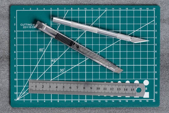Exacto Knife Metal Ruler On Green Stock Photo 1119735713