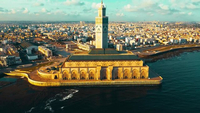 stunning aerial of the Casablanca waterfront with a focus on the mosque Hassan II, at the core of town
