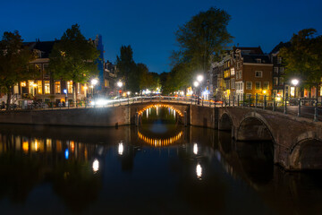 Illuminated Bridge on the Amsterdam Canal
