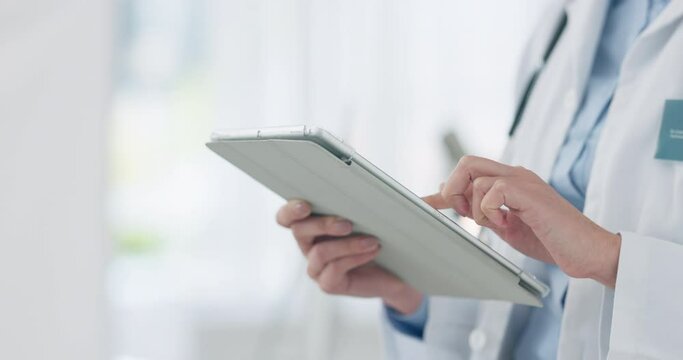 Hands, tablet or doctor with online results on website for medical info, research or evaluation. Surgeon, report or healthcare professional woman with technology to scroll for telehealth in hospital