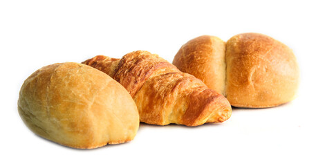 Fresh crispy baked bun and croissant on a white background