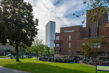 High School in Rotterdam, Nederland with a parking lot for bicycles and scooters