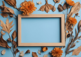 Empty wooden frame with flowers and dry leaves on blue. Generative AI