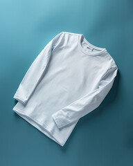 A clean and minimalistic white t-shirt mockup isolated on a blue background