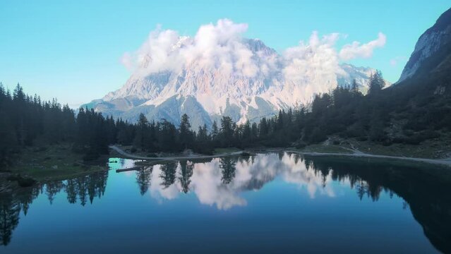 Mountain Lake reflection aerial drone video