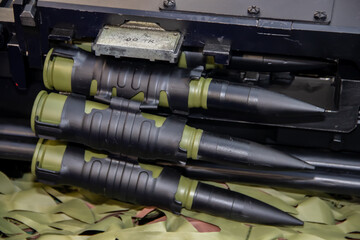 Close up of of bullets 11,8mm caliber in a coaxial machine gun, exposed at Military equipment international exhibition in Belgrade