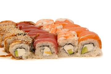 Sushi rolls with salmon, shrimp, eel, tuna.