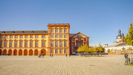 Fototapeta na wymiar Mannheim, Germany - October 26, 2010: Panoramic view over University campus in city center in Square district in sunset golden Autumn colors. Cityscape in the historical downtown at sunny day