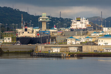 Fototapeta premium View of the Miraflores Locks. Giant locks allow huge ships to pass through the Panama Canal