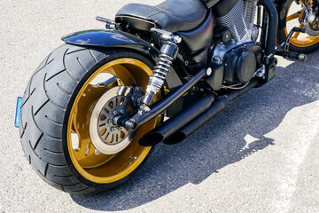 Custom motorcycle rear wheel, exhaust pipe muffler, brake disc, brake system, shock absorber