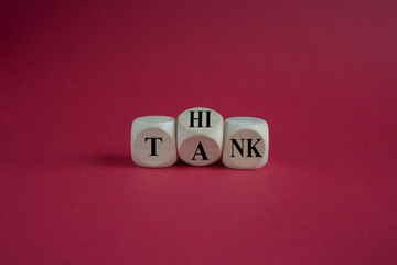 Think tank symbol. Turned a wooden cube and changes the word tank to think. Beautiful red...