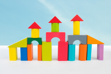 Palace from blocks of children's constructor against the blue sky.