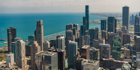 Fototapeta premium metropolis city skyline. aerial panoramic view on downtown cityscape. skyscraper aerial view. cityscape skyline. architectural building in metropolis. skyscraper architecture of chicago seaside city
