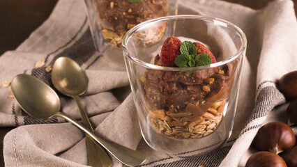Couple of glasses of chocolate and chestnuts mousse