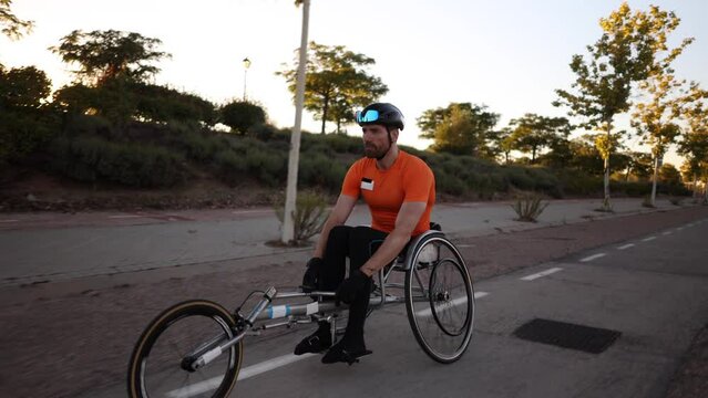He's a middle-aged Caucasian athlete who's honing his racing skills in a wheelchair, with his sights set on the Paraolympics