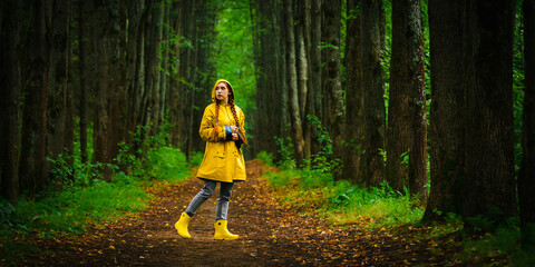 Woman in yellow raincoat