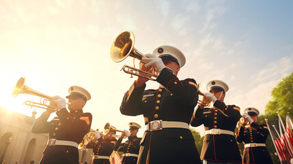A military musical band marches at a festive military parade on the street on a sunny day....