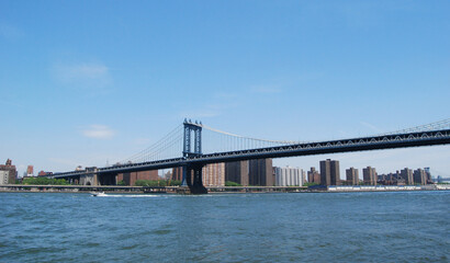 Fototapeta na wymiar The blue Manhattan Bridge as seen from Brooklyn in New York City, New York, USA