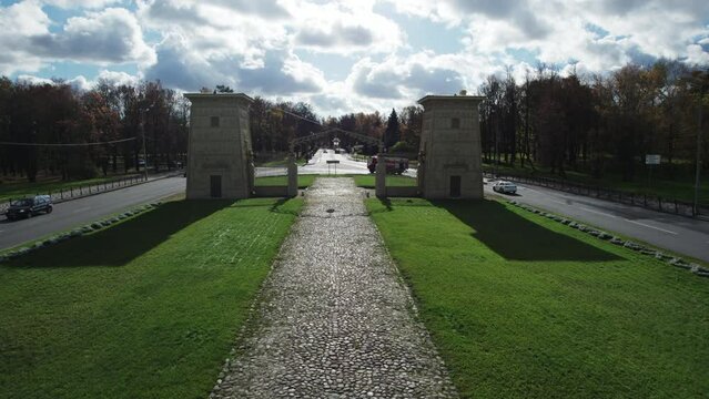 Aerial drone view of the historic Egyptian Gates in Pushkin, Tsarskoye Selo, Saint Petersburg, Russia. Neoclassical city gates surrounded by a landscaped park and urban roads.
