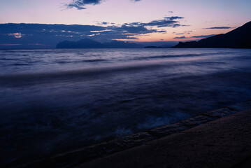 Dusk and dawn landscape. Beautiful Crimean sea bay at evening time.